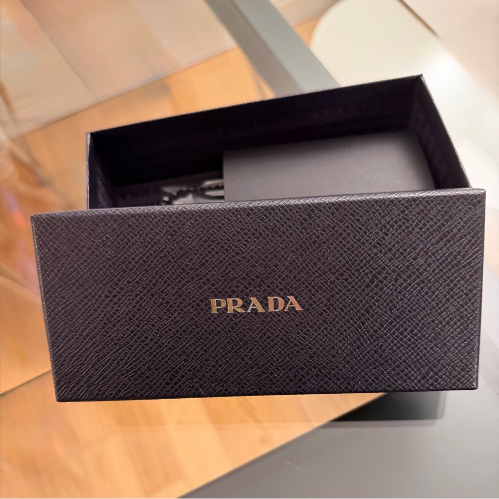 Prada sunglasses box and microfiber cloth